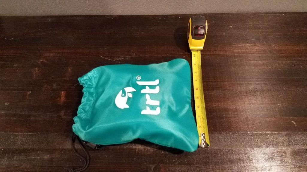 a measuring tape next to a bag