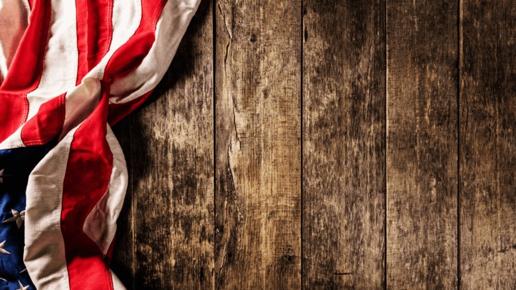 Image of Flag over dark brown wooden planks