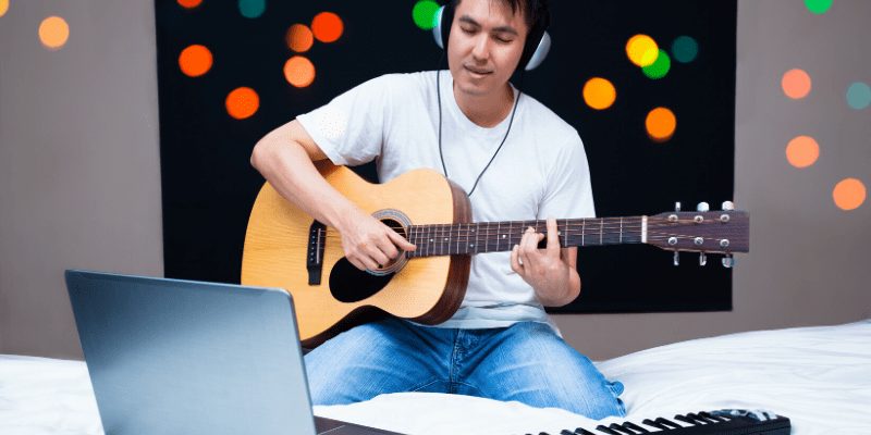 image of man playing guitar
