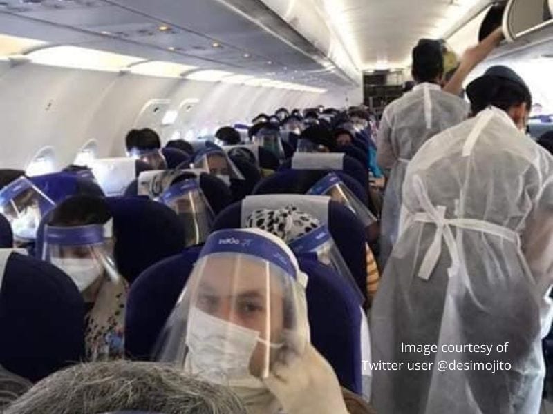 A picture is circulating social media of the first IndiGo flights post COVID-19 lock down. The image is shocking, in a way, in that it depicts a plane full of passengers wearing airline-issued face shields over the top of face masks.