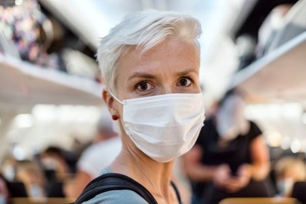 face mask on an airplane