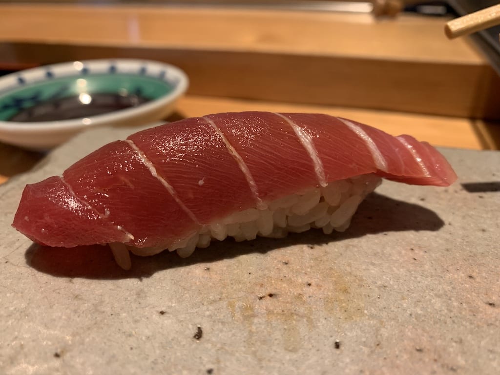 a sushi on a plate