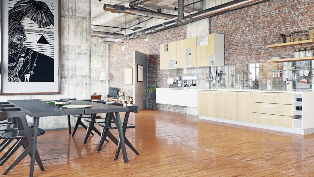 a room with a table and a kitchen