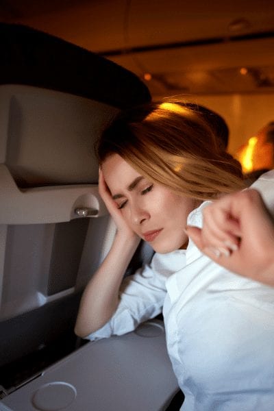 Why is it so hard to sleep on a plane