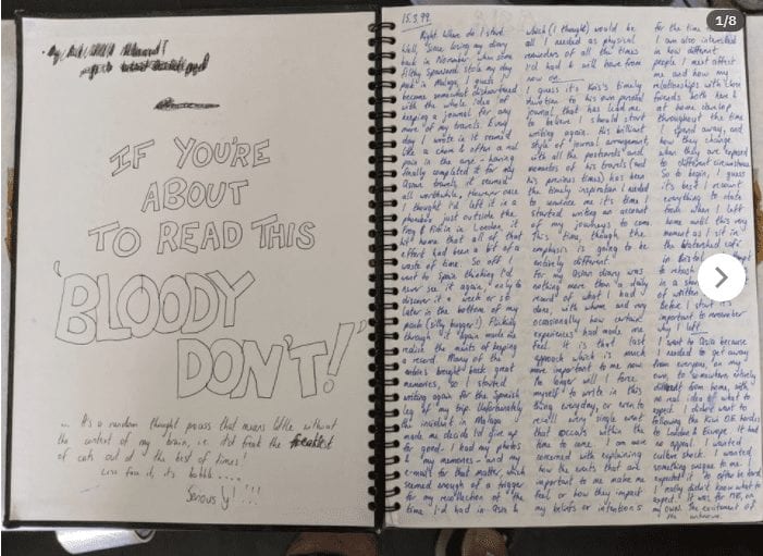 a notebook with writing on it
